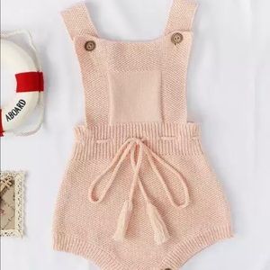 Knitted baby romper